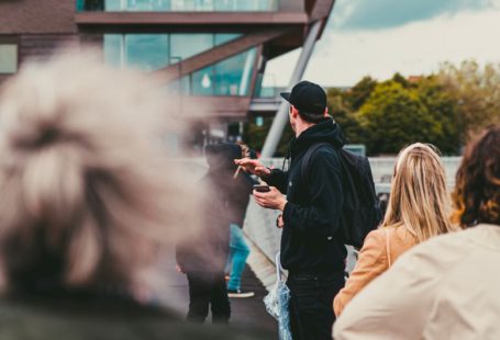 Startup Guide - people standing near building
