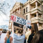 Youth Power - assembly of people front of building