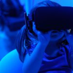 Future Trends - girl using VR goggles
