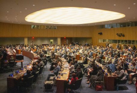 SDGs Goals - people sitting on chairs inside building