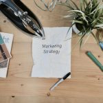 Marketing Strategy - white printing paper with Marketing Strategy text