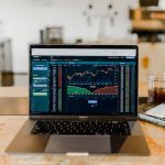 Impact Fund - turned-on MacBook Pro