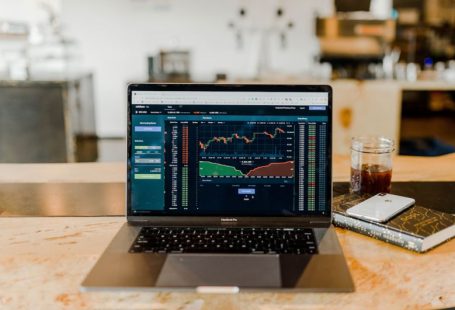 Impact Fund - turned-on MacBook Pro