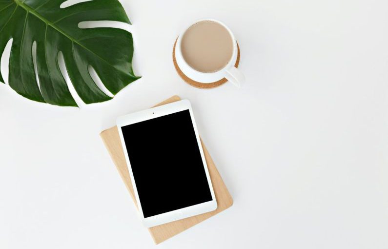 Green Marketing - white iPad on white surface