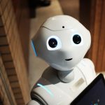 Retail Innovation - white robot near brown wall