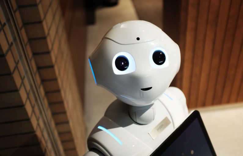Retail Innovation - white robot near brown wall