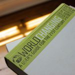 Sustainability Guide - World Changing book on white table