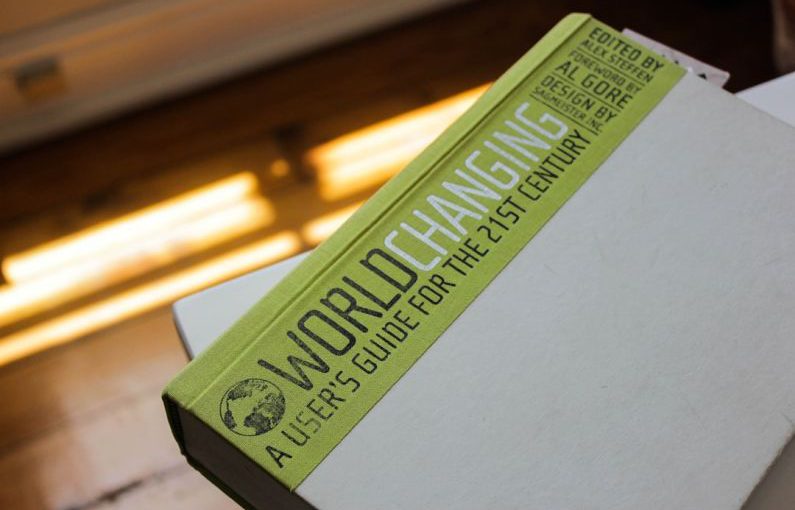 Sustainability Guide - World Changing book on white table