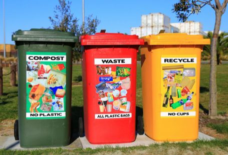 Recycling Program - red yellow and green trash bins