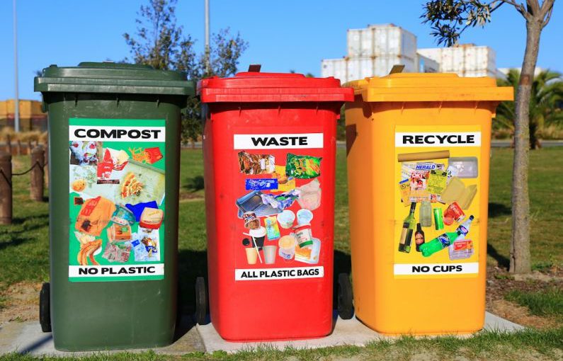 Recycling Program - red yellow and green trash bins