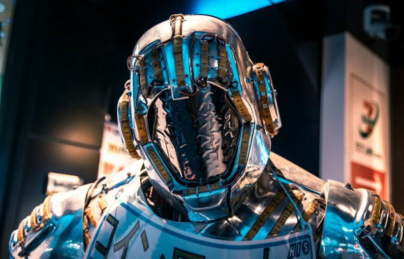 Biomimicry Innovation - blue and black helmet on blue and white textile